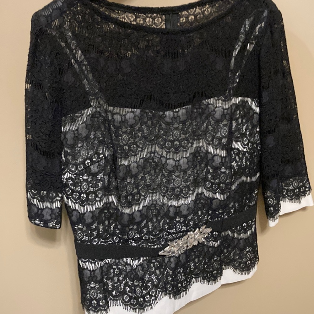 Chic Black and White Blouse with Elegant Design